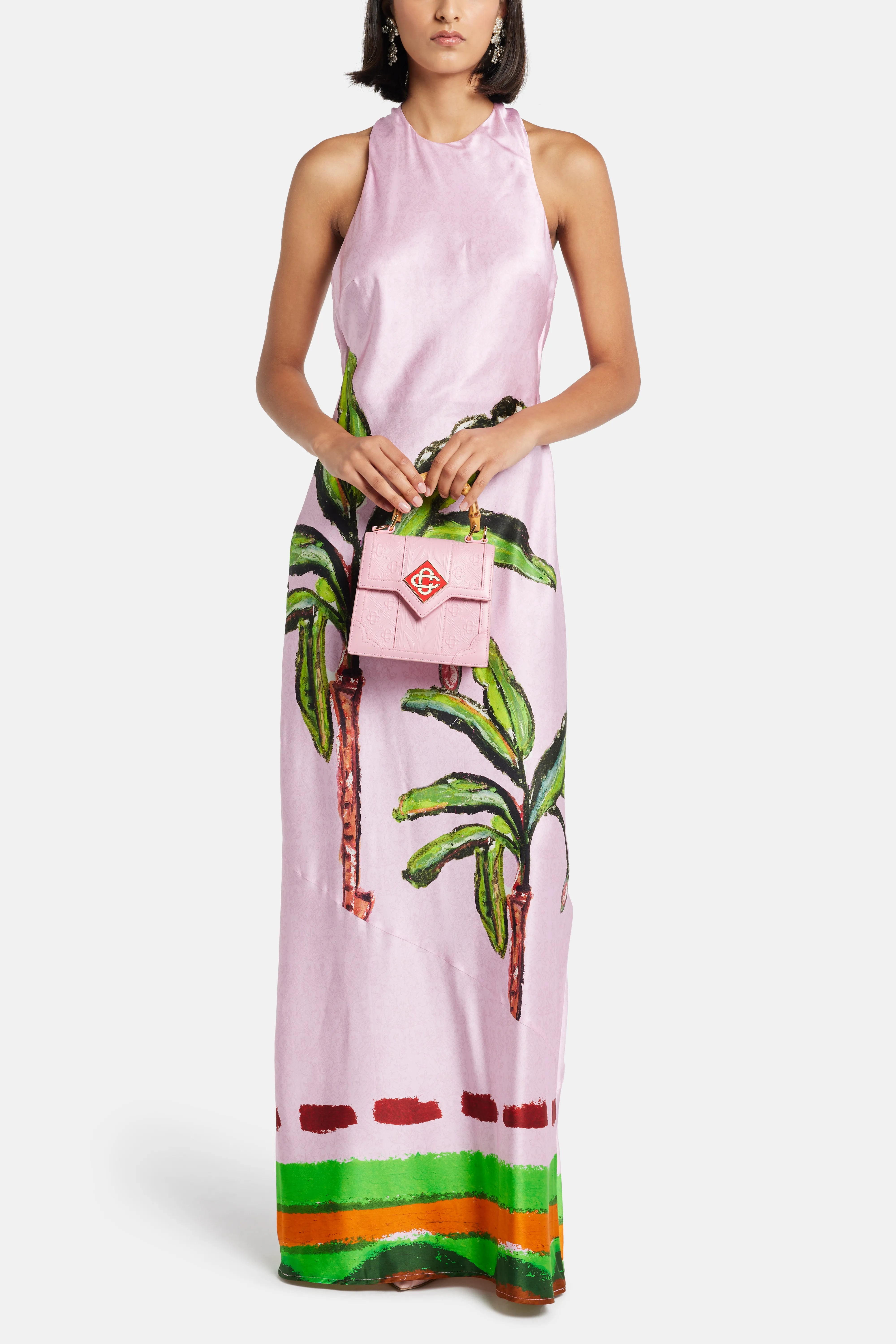 فستان كومولاو طويل من الحرير بدون أكمام وذو ظهر مفتوح باللون الوردي