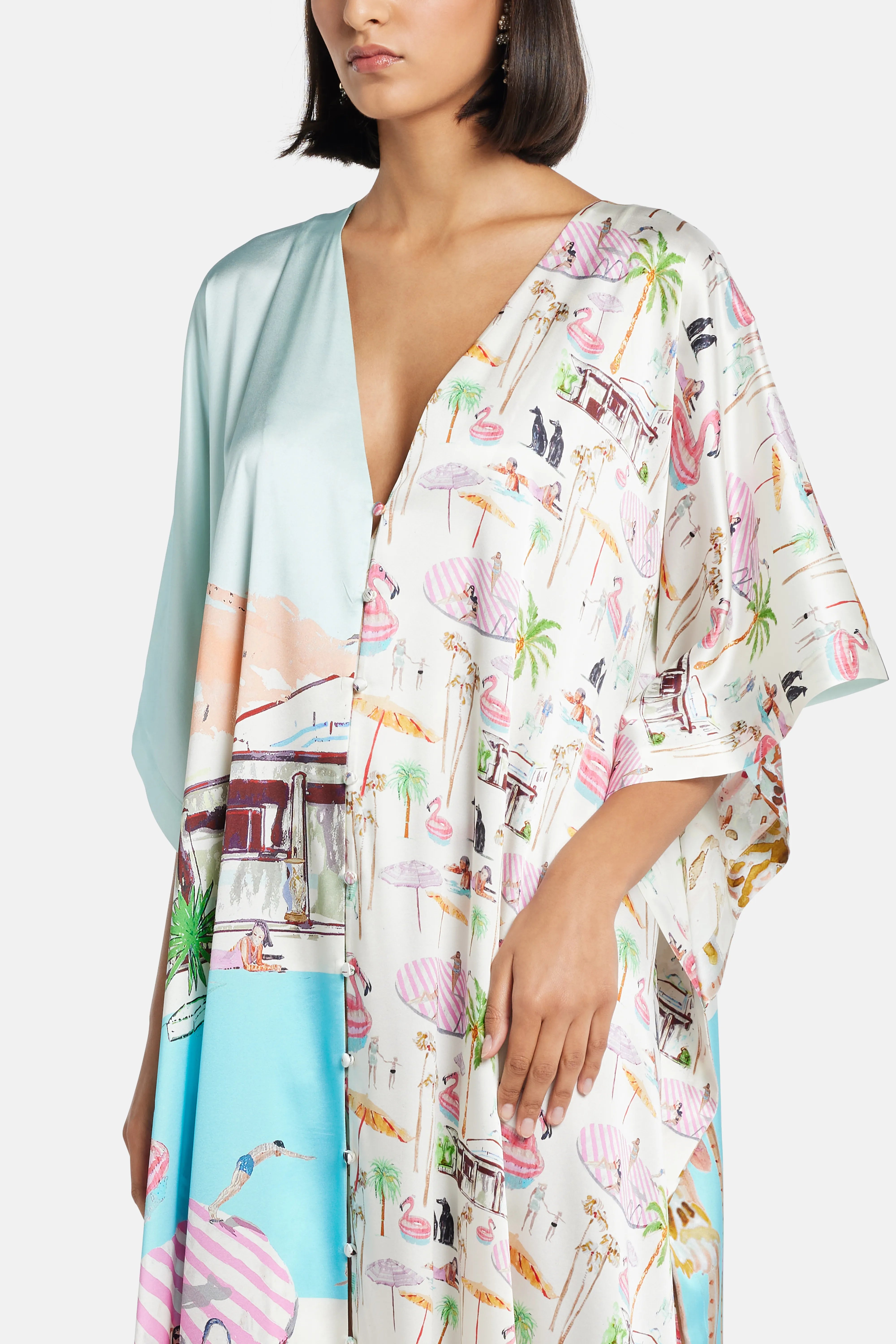 قفطان فلامينغو كلوب من الحرير برقبة على شكل V باللون الوردي