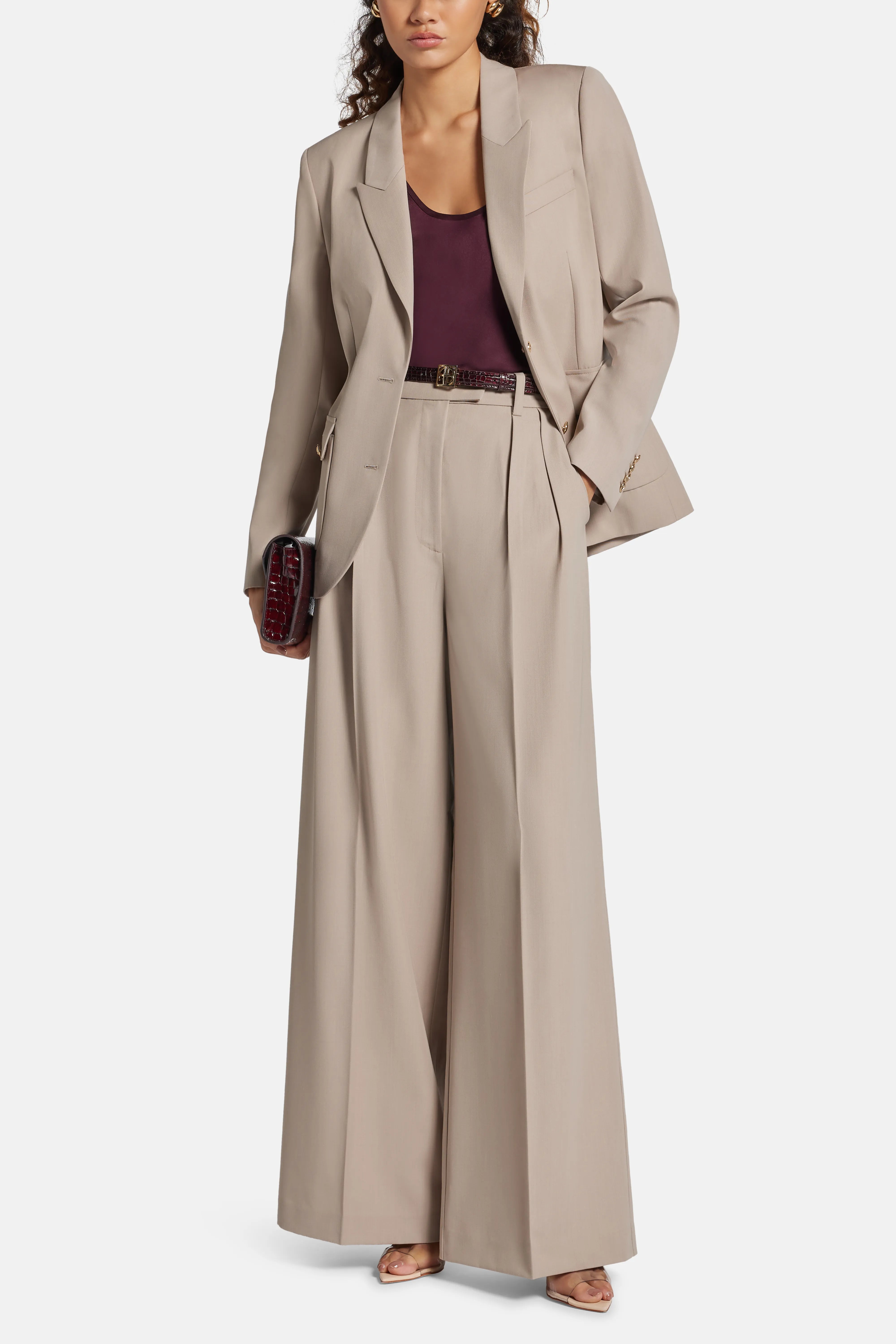 Lou High Waisted Flared Wool Trousers in Beige