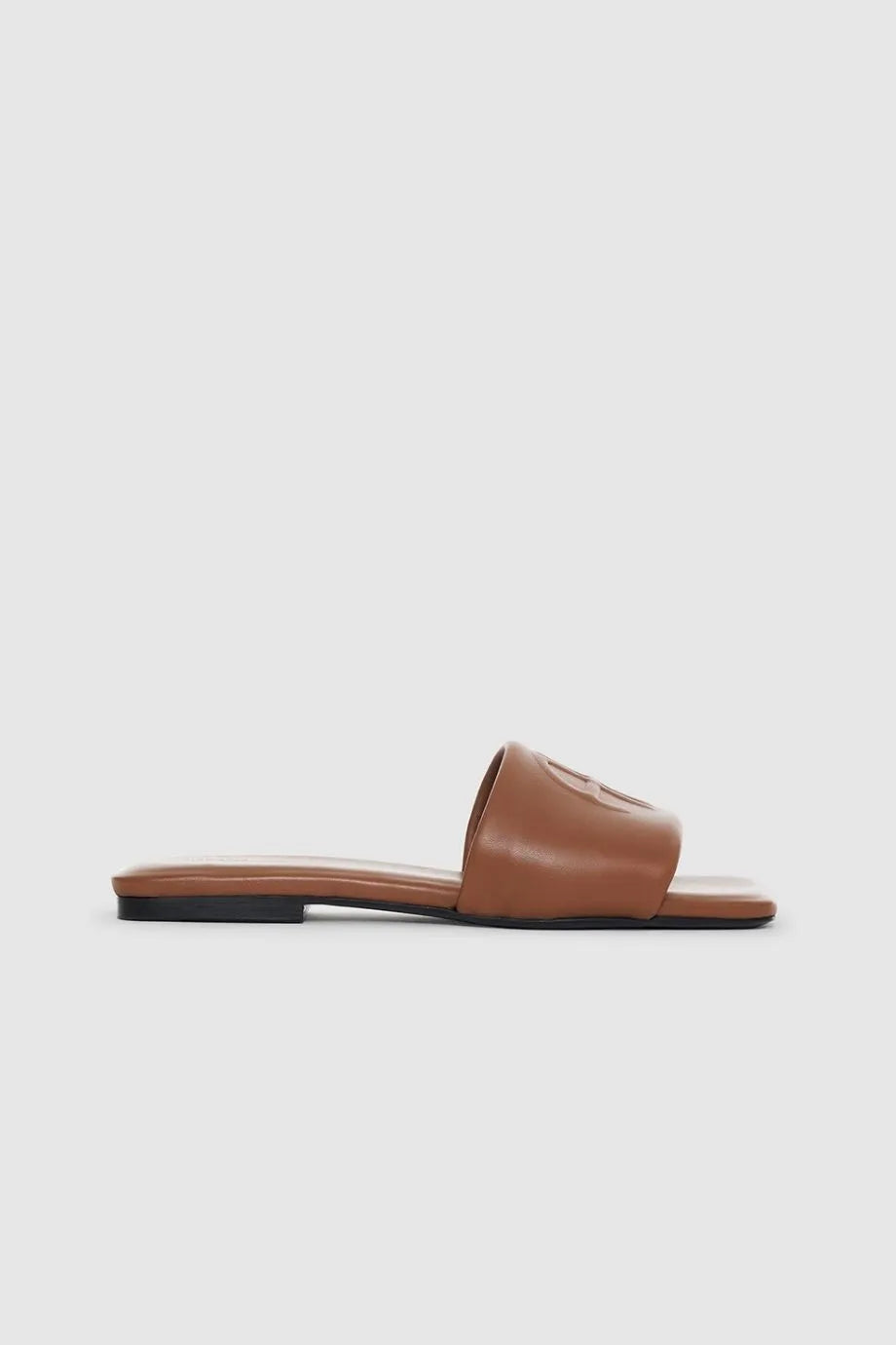 Ria Leather Monogram Embossed Sandals Slides in Brown
