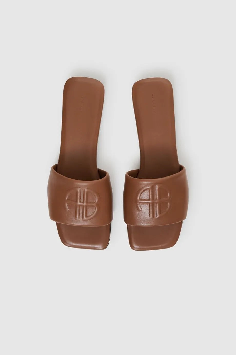 Ria Leather Monogram Embossed Sandals Slides in Brown