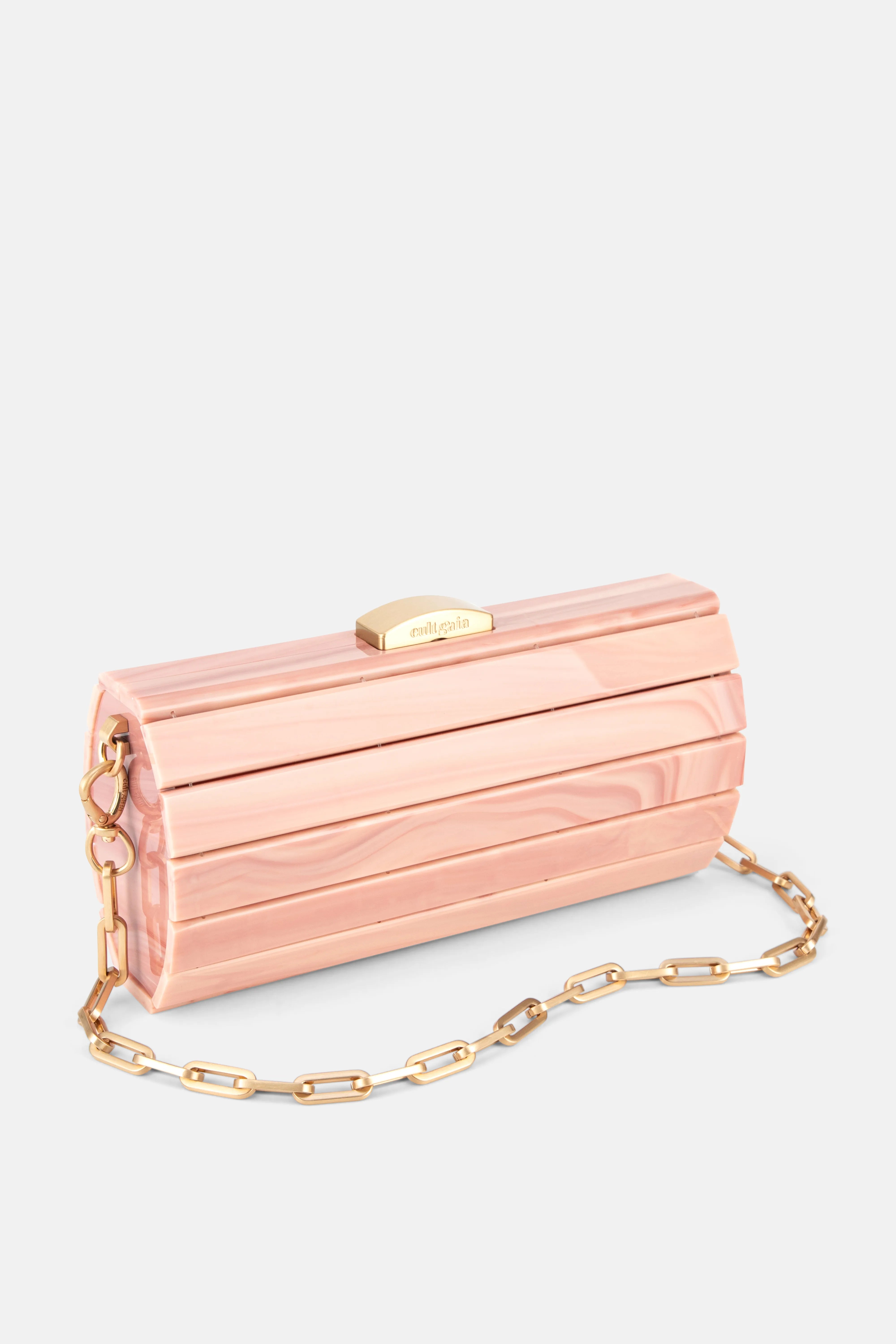 Rolie Polie Mini Clutch Bag in Pink