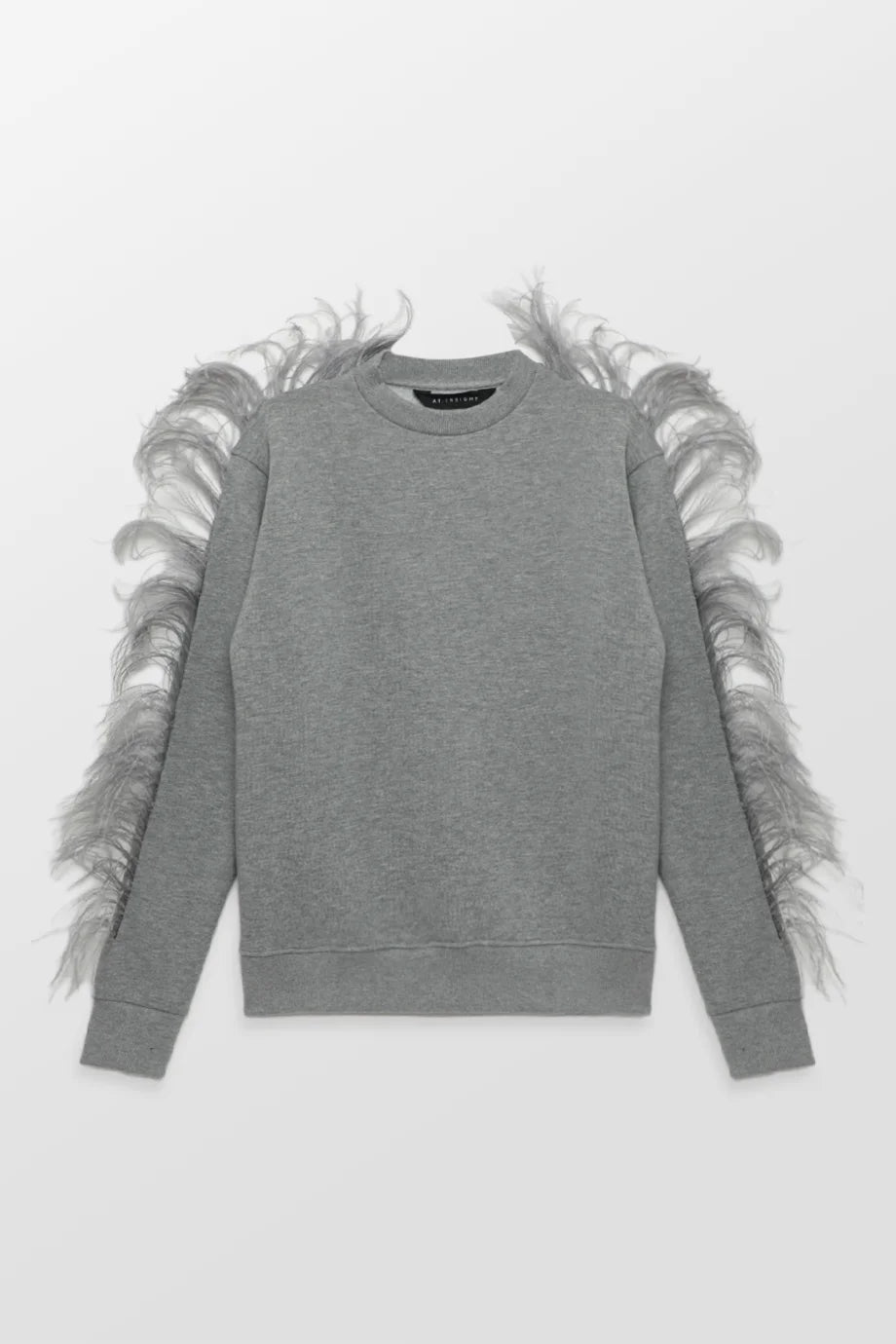 grey sweater with feathers