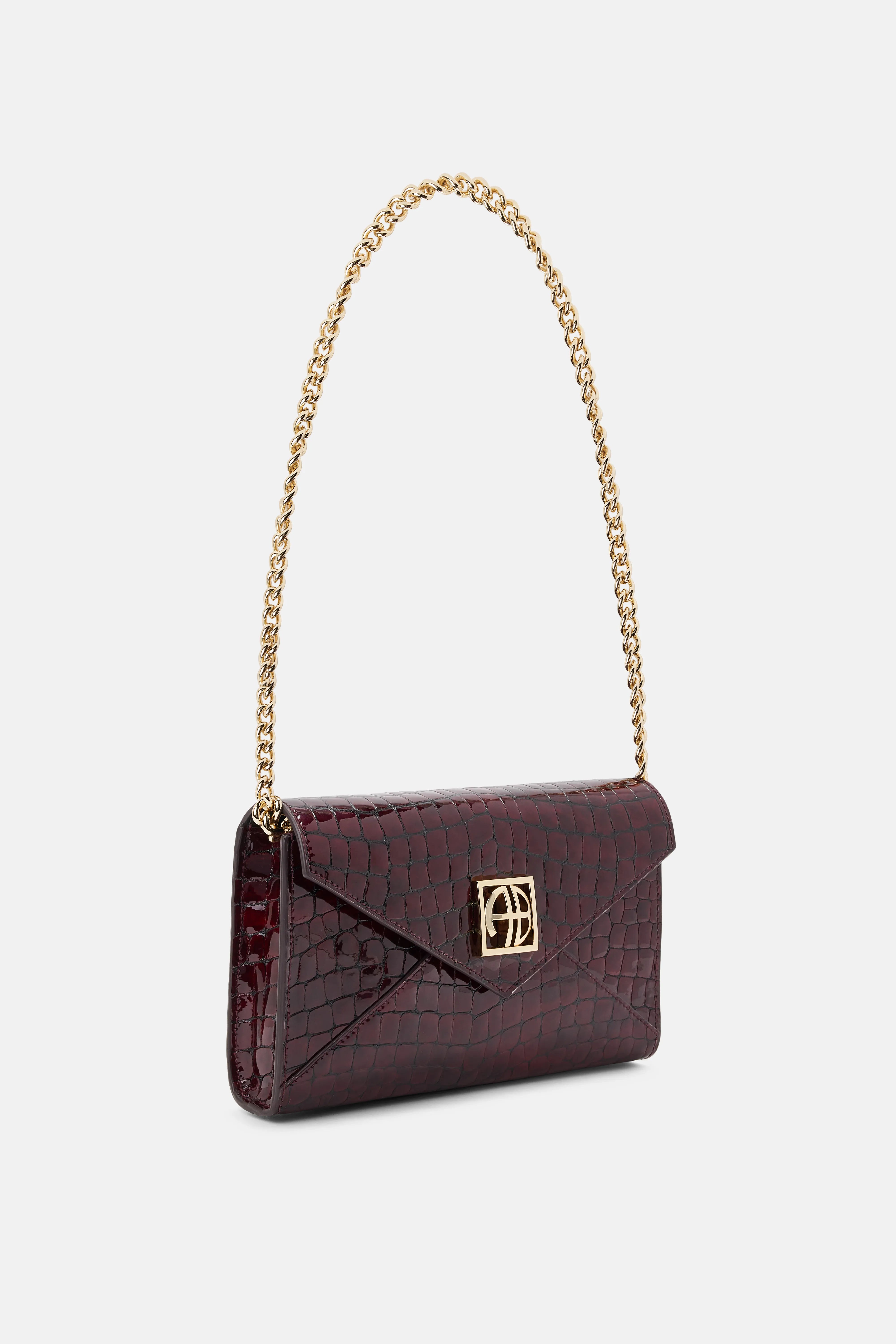 Elly Logo Embossed Mini Clutch Bag in Burgundy