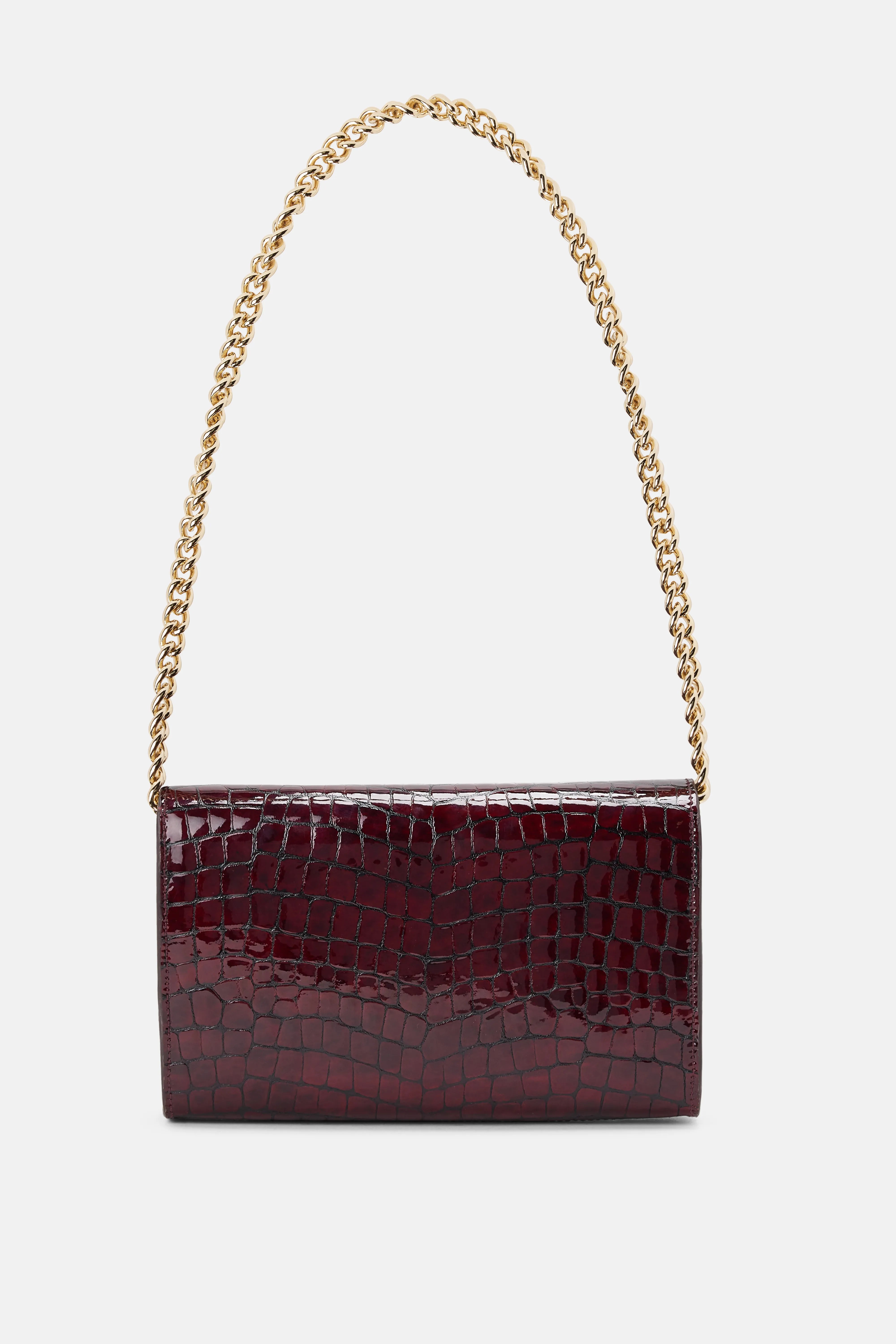 Shop The Elly Logo Embossed Mini Clutch Bag In Burgundy shop-the-elly-logo-embossed-mini-clutch-bag-in-burgundy