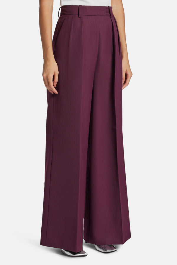 Lou High Waisted Flared Wool Trousers in Burgundy