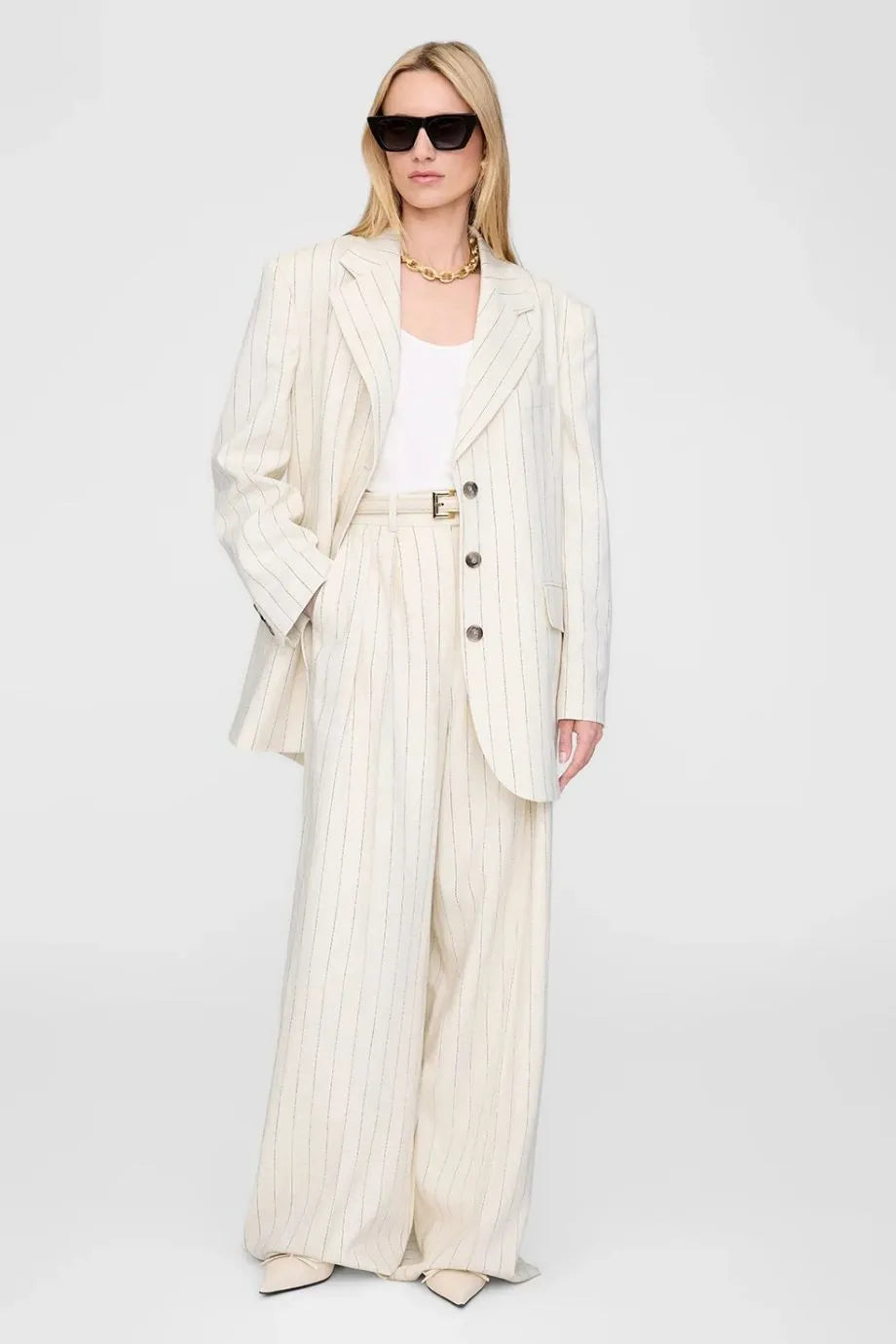 Lou Wide Legged Flared Trousers in Cream
